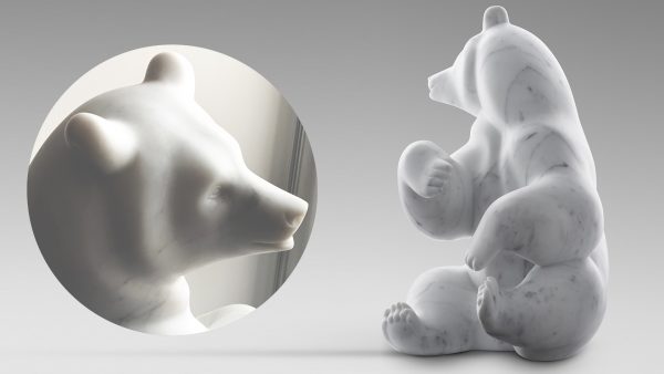 Picture of a marble sculpture representing a bear made by artist Michel Bassompierre, currently on show at Galerie Montmartre, Paris, France