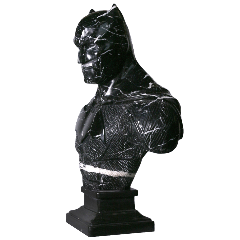 Picture of a black Portorro marble sculpture of Batman, by French artist Léo Caillard, represented at Galerie Montmartre, Paris, France