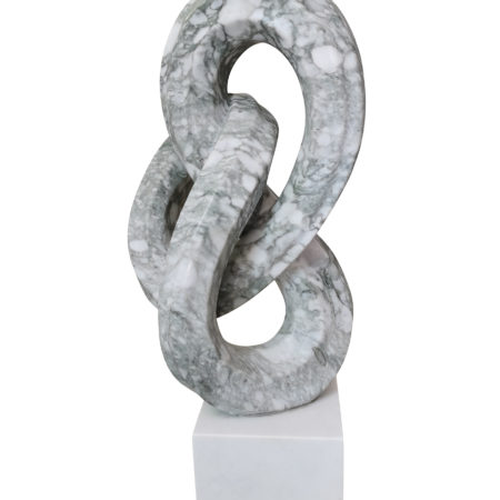 Picture of a marble sculpture titled Infinity Stone, created by French artist Leo Caillard, represented at Galerie Montmartre, Paris, France