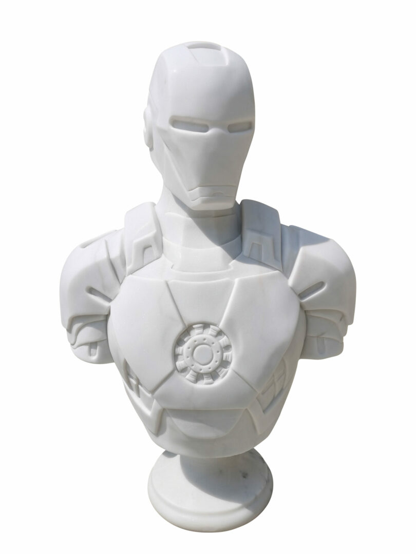 Picture of a marble sculpture depicting Iron Man, from Marvel, created by French artist Leo Caillard, represented at Galerie Montmartre, Paris, France
